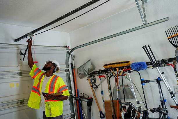 Professional Garage Door Panel Replacement technician working in Dakota County County, NE